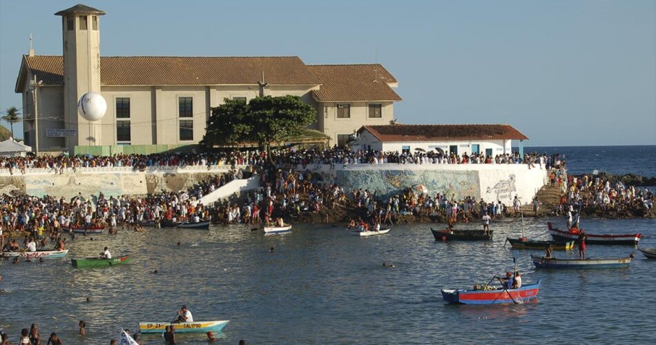 a group of people in boats in the water