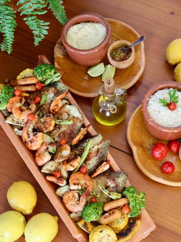 Na Bahia, a Semana Santa tem dendê: chef Deliene Mota celebra a tradição que o bacalhau não alcança encantos da maré semana santa